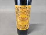 a bottle of wine that is sitting on a table