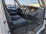 a picture of the inside of a truck with the driver ' s seat up
