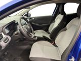 the interior of a blue car is clean and ready to be used