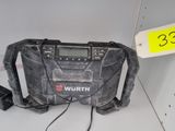a radio that is sitting on top of a shelf