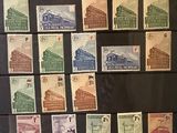 a picture of a collection of stamps on display in a glass case