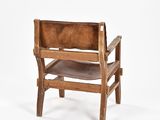 an old wooden chair with a leather seat on a white background