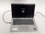 a laptop computer that is sitting on a table