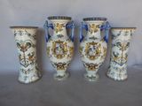 three vases with handles and handles are lined up against a white background