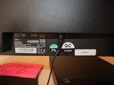 an image of a computer monitor with a mouse on top of it