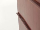 an image of a close up of a wooden dresser