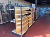 many shelves in the store with many items on them