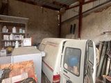 a van that is parked inside of a building