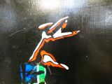 a sticker on the door of a building with a picture of a person on it