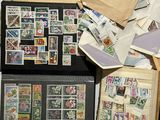 many different types of stamps on a table
