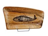 a wooden plaque with a fish on it