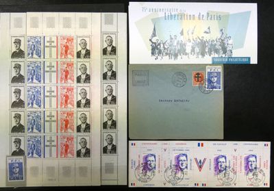 Plusieurs timbres différents sont exposés sur un fond noir