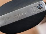 a close up of a metal object with a number on it