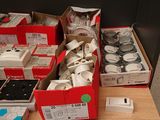 many boxes of electronic devices sitting on a table