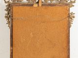 a picture of an old wooden easer with a picture on it
