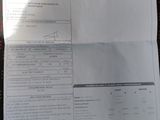 un document sur lequel figure la photo d'un permis de conduire