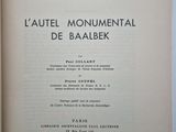 a close up of a book on a table with a white background