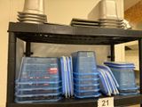 many plastic containers on a shelf in a store