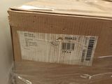 a box that is wrapped in plastic and sitting on the floor