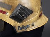 a close up of a fireman ' s helmet on display