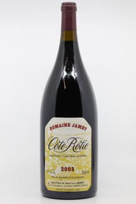 l'image d'une bouteille de vin posée sur une table
