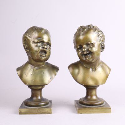 paire de bustes anciens en bronze représentant un garçon et une fille