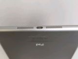 the back of a tablet computer with a small screen on top of it