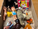 a box with a bunch of stuffed animals in it