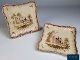 deux assiettes avec l'image d'un homme et d'une femme