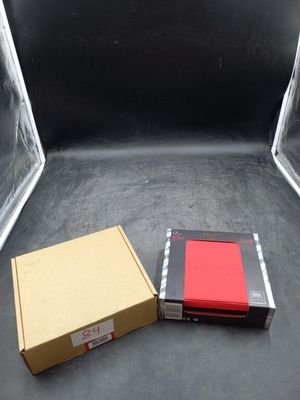 two boxes that are sitting on the floor