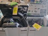 a pile of electronic equipment that is sitting in a box