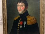 portrait d'un homme en uniforme militaire dans un cadre doré