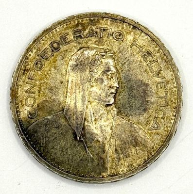 Pièce en argent de 5 francs suisses datée de 1953 - Quelques…