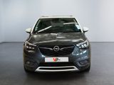 the front view of a grey opel parked in a showroom