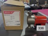 a box and a pump on a table in a store
