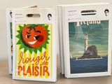 two bags that are sitting on top of a table