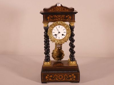 a clock that is sitting on top of a table