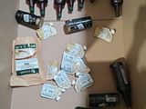 many bottles of beer in a cardboard box on the floor