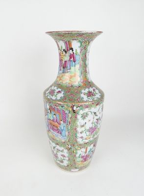 a vase that is sitting on a white surface