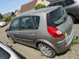 a small car that is parked in a lot