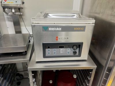 une image d'une machine qui se trouve dans une cuisine