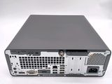 the back of a computer with a hard drive attached to it