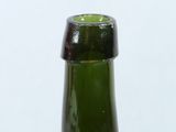 a bottle of beer that is sitting on a table