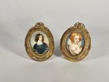 une paire de portraits miniatures représentant une femme et un enfant
