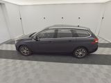 the car is parked in the garage on the checkered floor