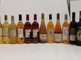 a lot of bottles of wine sitting on a table