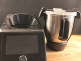 a picture of a blender and a mixer on a wooden table