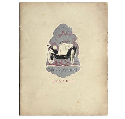 un vieux livre sur lequel figure l'image d'une voiture