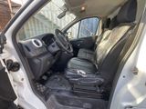 a white van with black leather seats in the back of it
