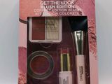 a close up of a box of makeup on a table